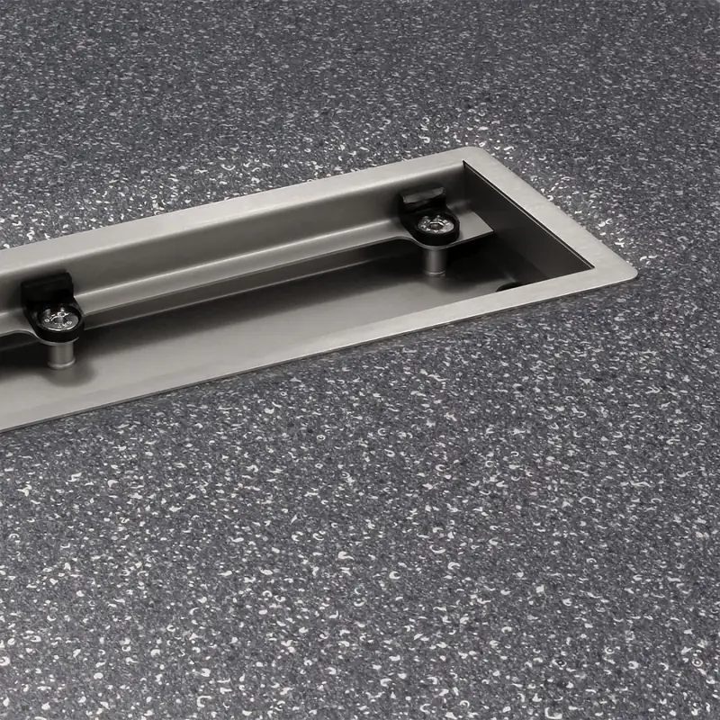 Vinyl floor finished around a Wiper VF clamp drain